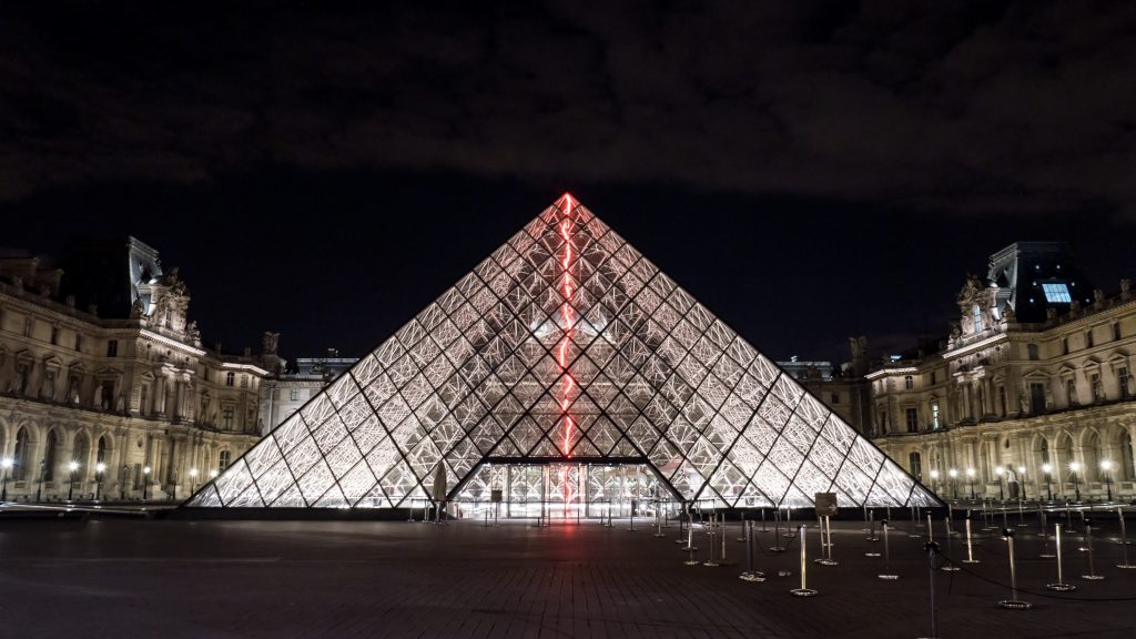 Illuminated glass pyramid at the Louvre, Paris